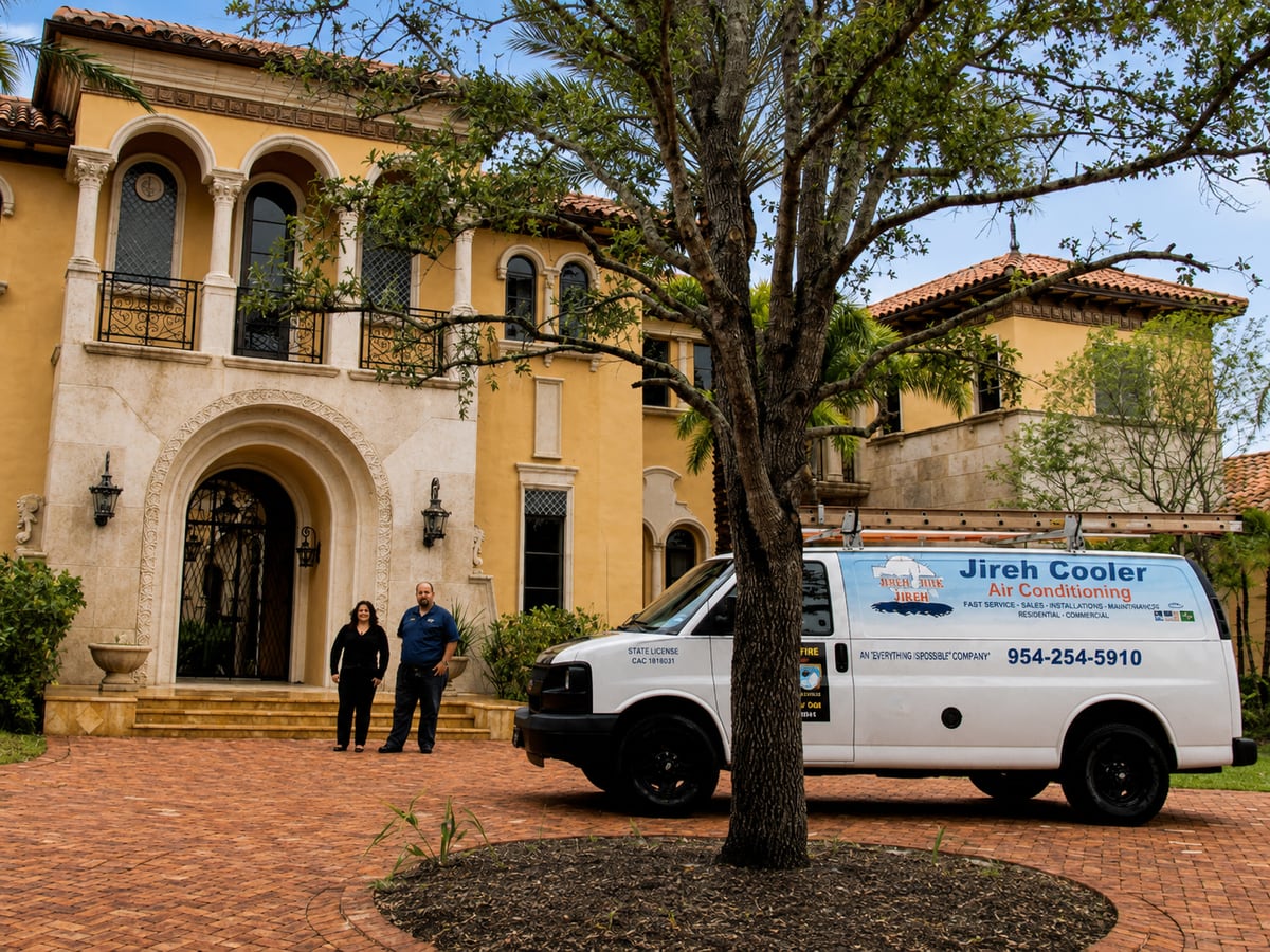 Jireh Cooler service van parked outside a South Florida estate home