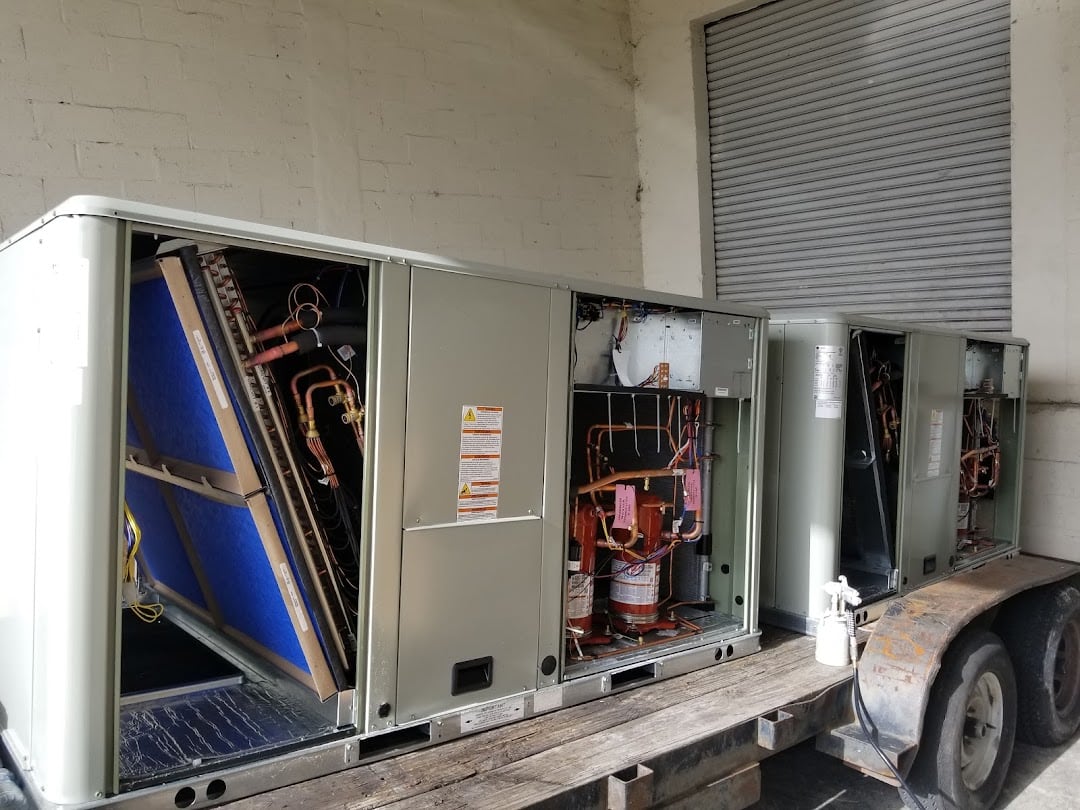 Commercial HVAC package units staged and ready for installation