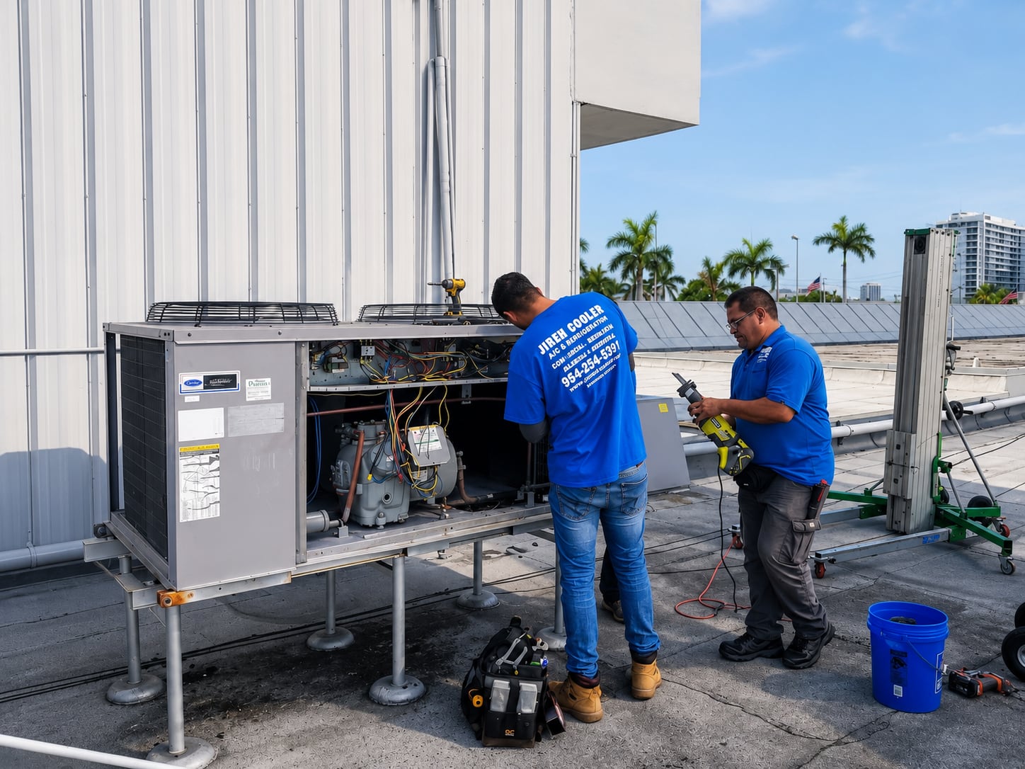 Jireh Cooler technicians servicing a commercial rooftop HVAC unit
